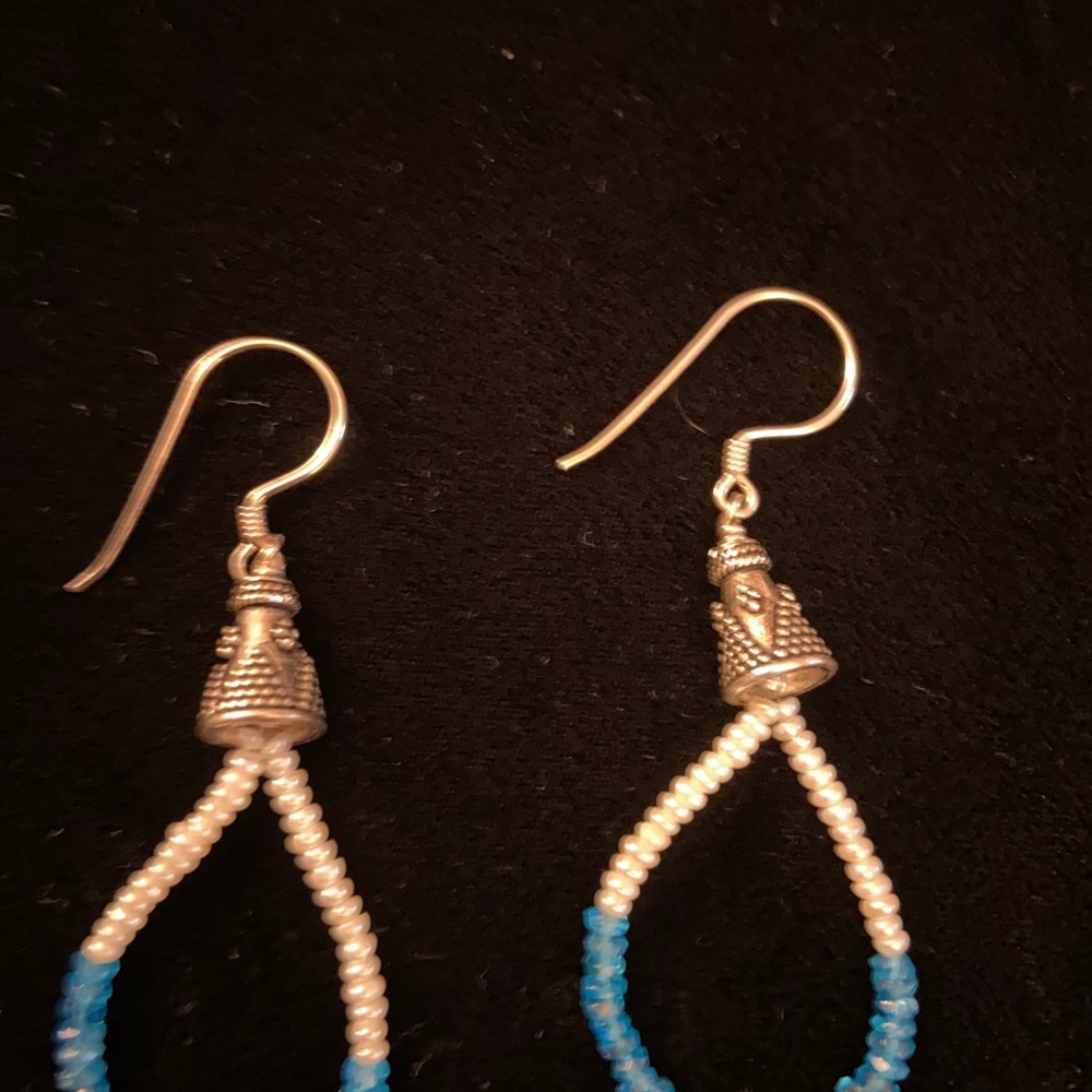 Blue and gold dangling earrings